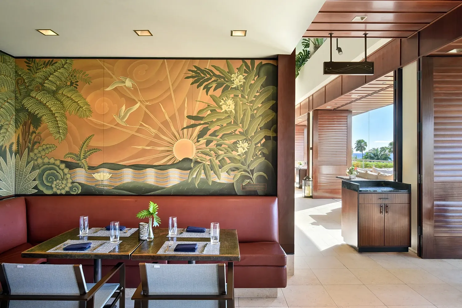 Medical examination room with a blue chair.