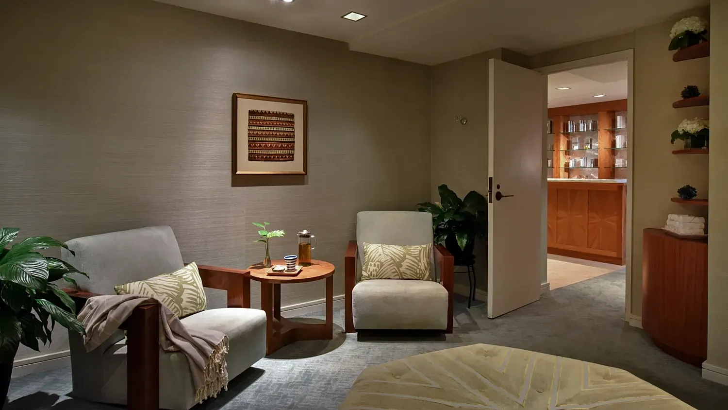 Cozy interior with chairs and natural elements.