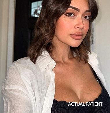 Woman in bikini posing on a yacht.